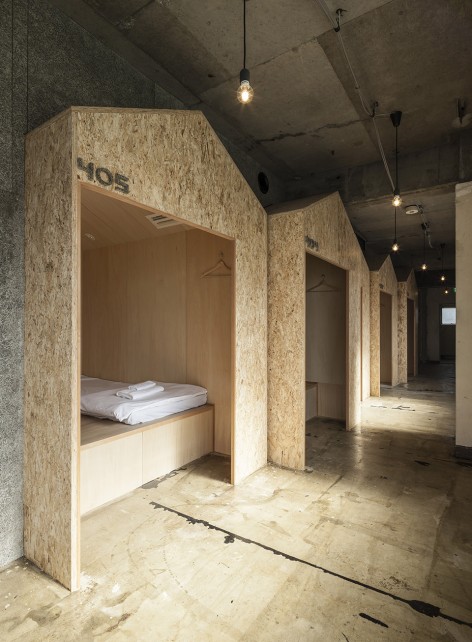 9-Huts Inside Layered History by Aida Atelier