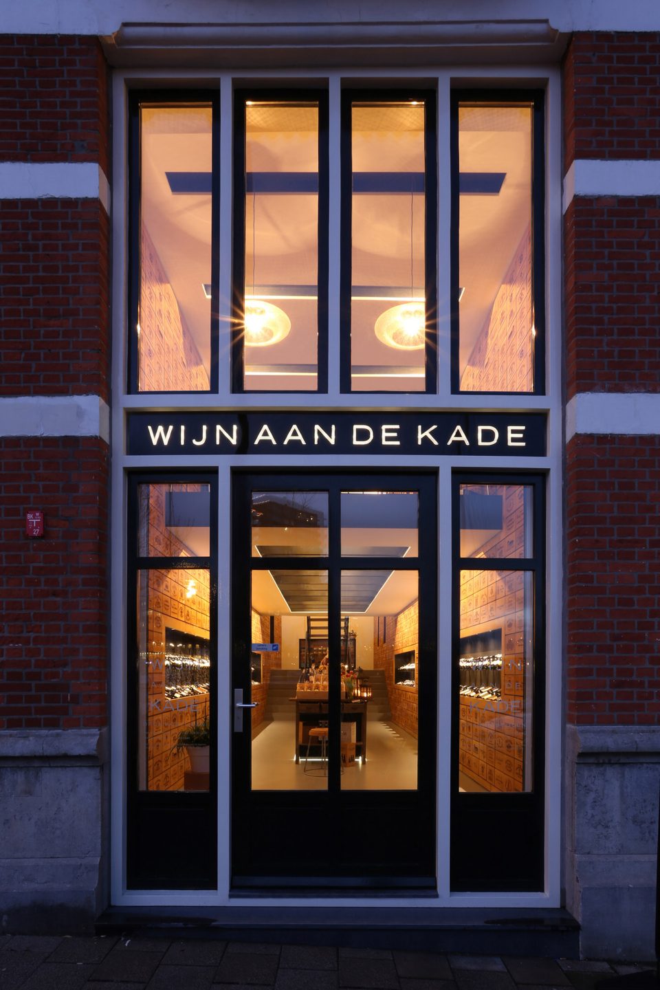 Wineshop Clad with 2100 Engraved Oak Panels