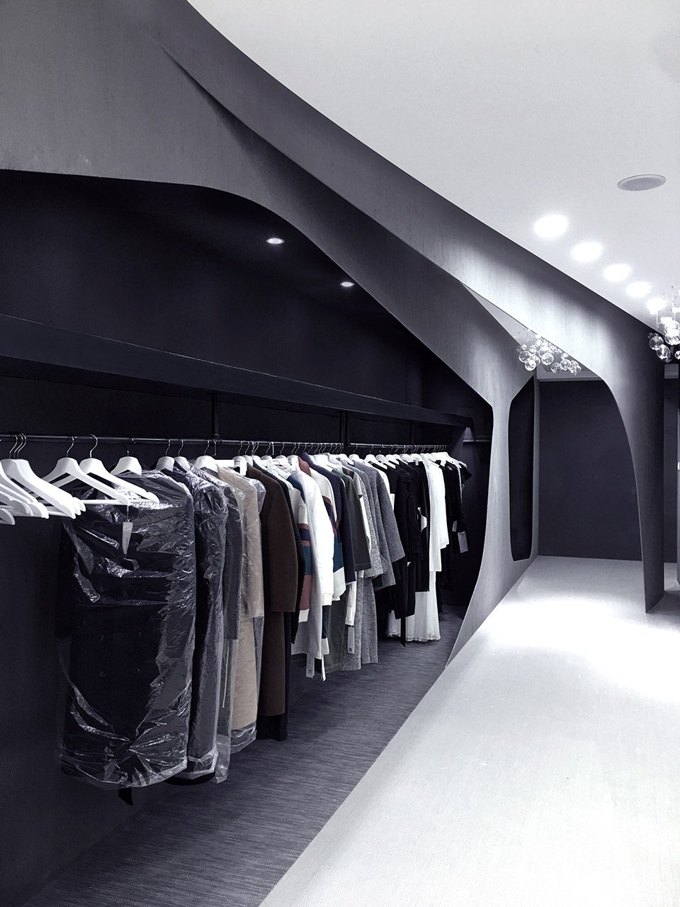 Winking Fashion Clothing Store by AND Design Group