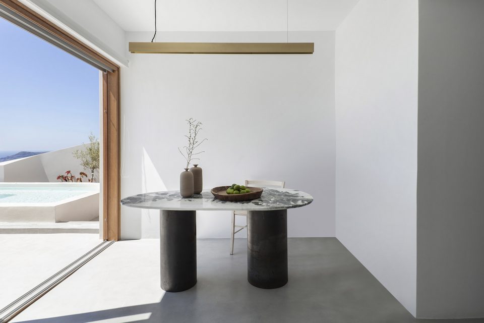 Two Holiday Houses in Firostefani by Kapsimalis Architects
