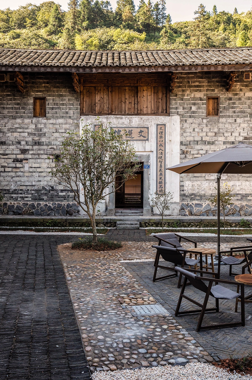 tsingpu tulou retreat by trace architecture office