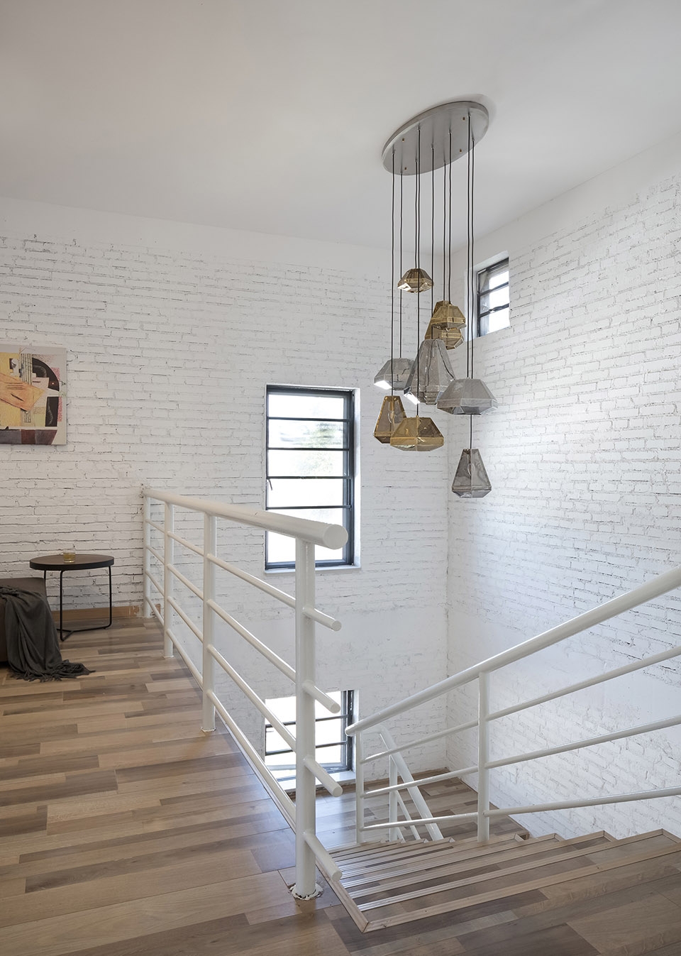 a white hillside house by ming ding spatial art studio