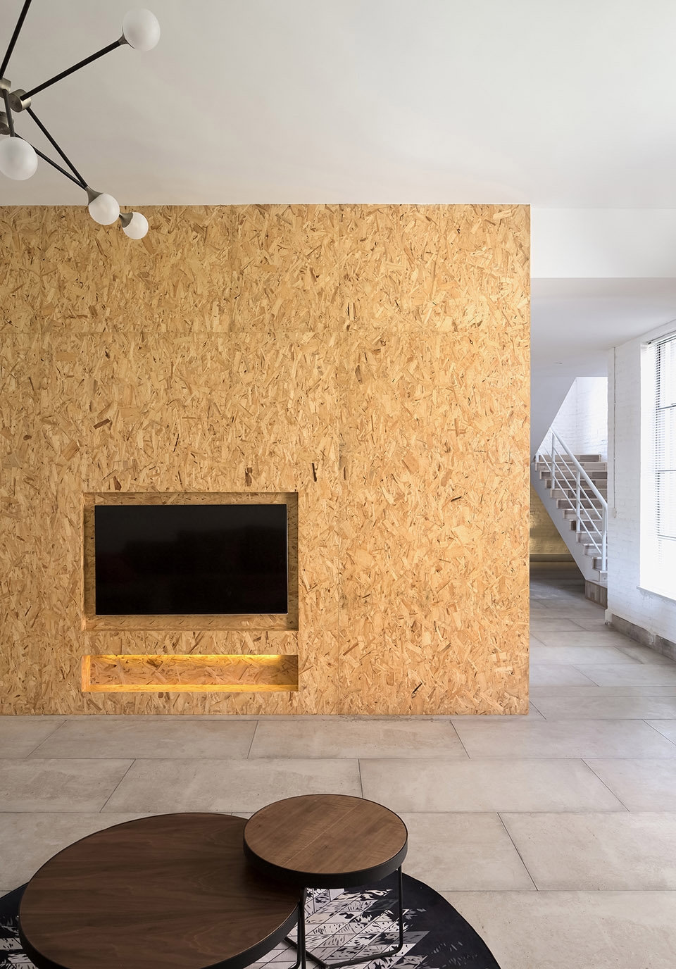 a white hillside house by ming ding spatial art studio