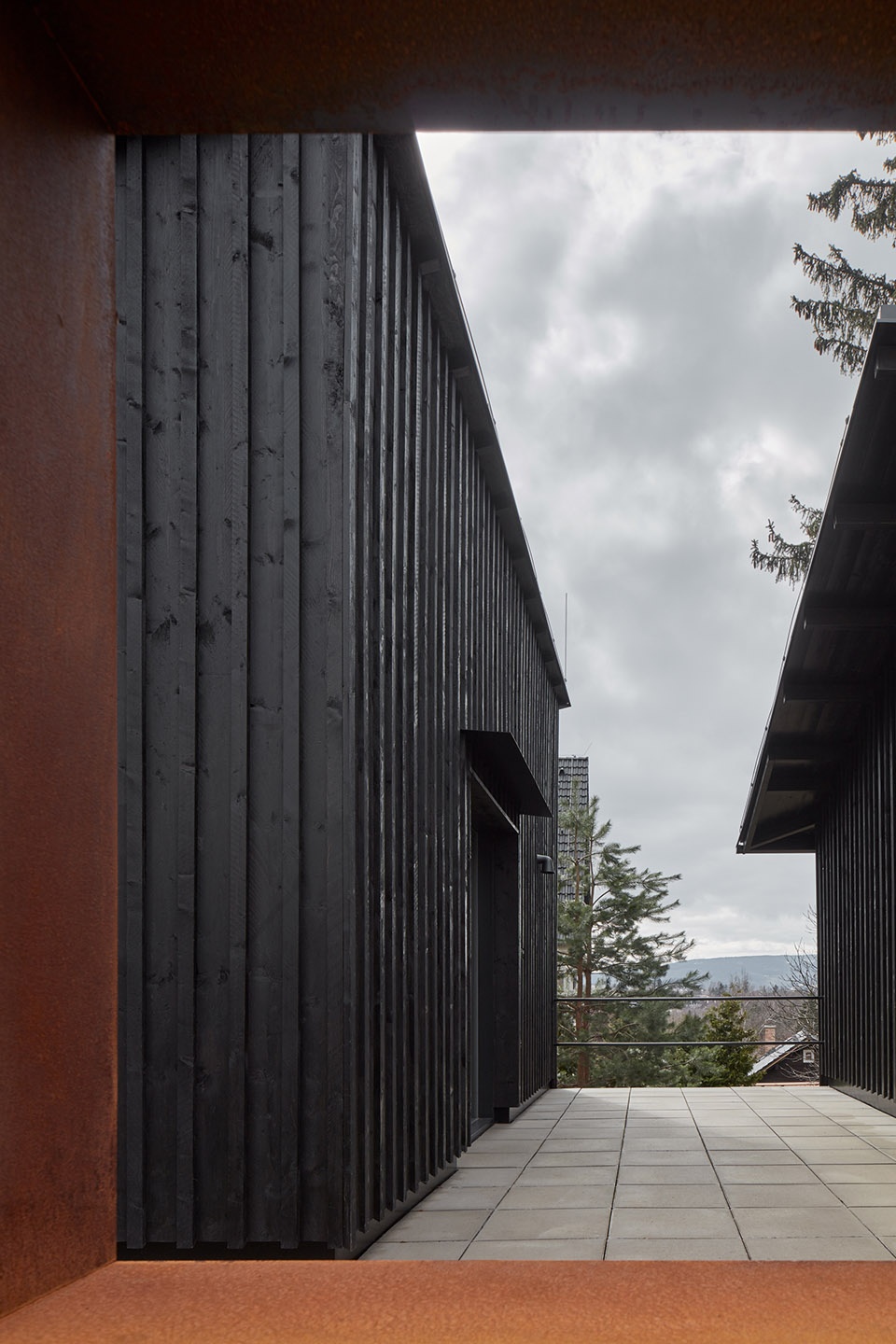 house behind the wall by mjolk architects