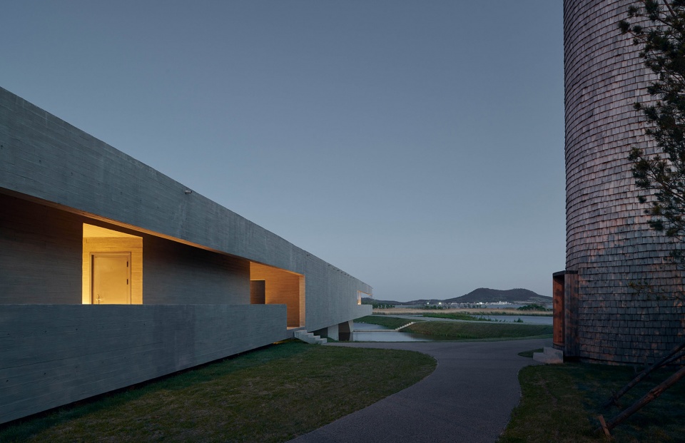 swan lake bridge house and viewing tower in shandong china by tao trace architecture office