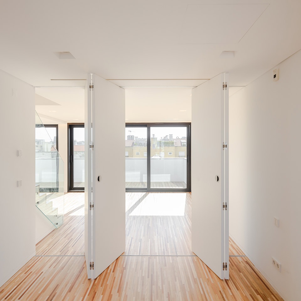lisbon wood building by plano humano arquitectos