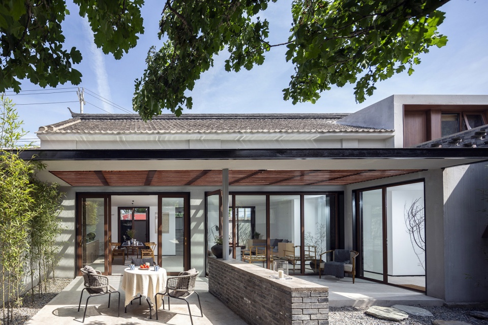 the shared village space evolution of red fruit tree small tavern by evolution design