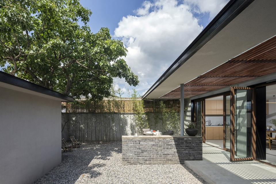 the shared village space evolution of red fruit tree small tavern by evolution design