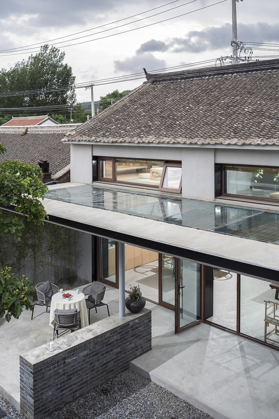 the shared village space evolution of red fruit tree small tavern by evolution design