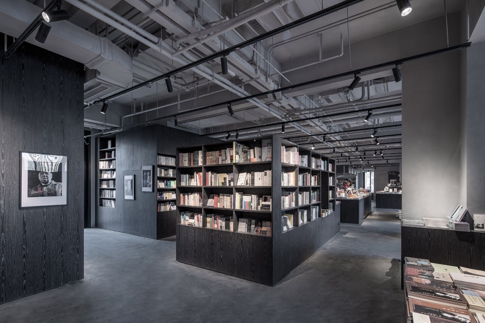 owspace book store design in aranya by b l u e architecture studio