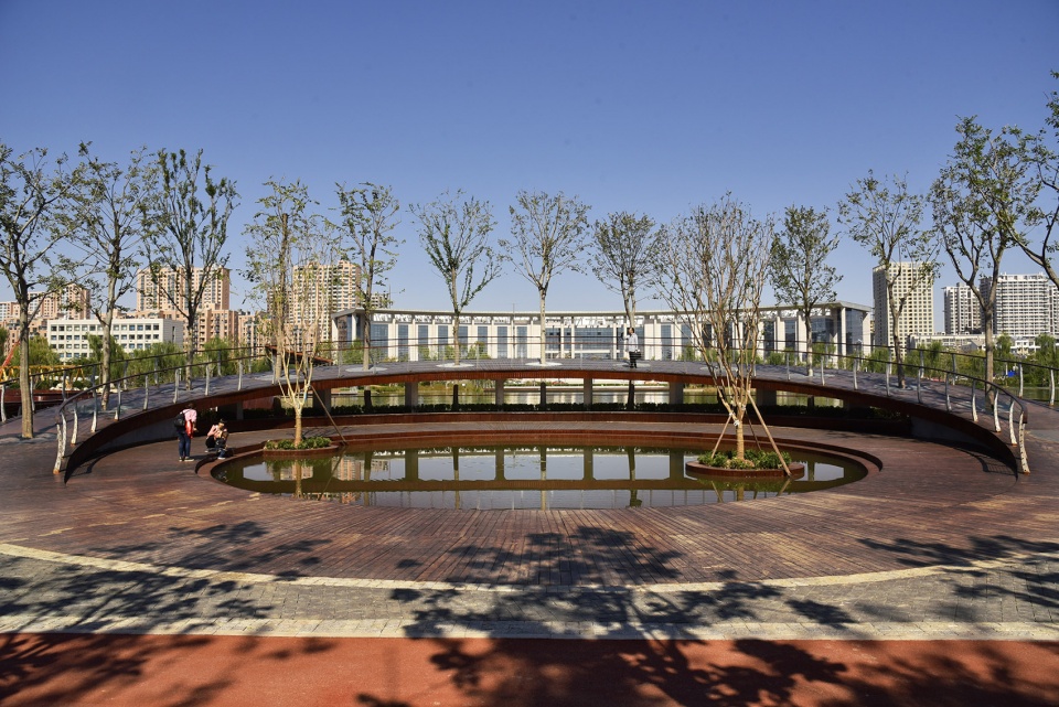 water platform of anlan lake park tree loop china by folie architecture