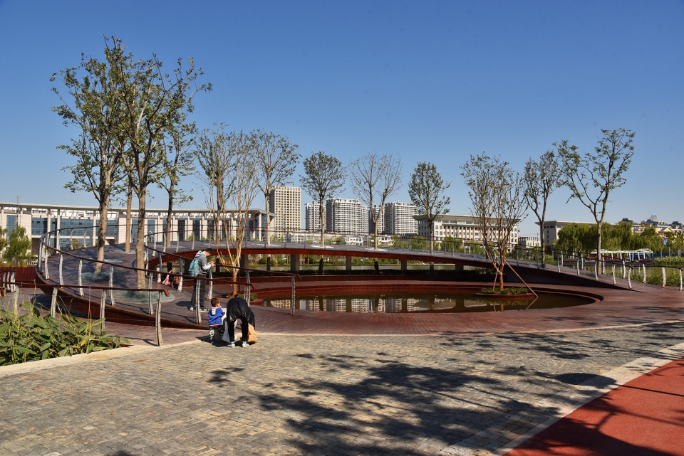 water platform of anlan lake park tree loop china by folie architecture