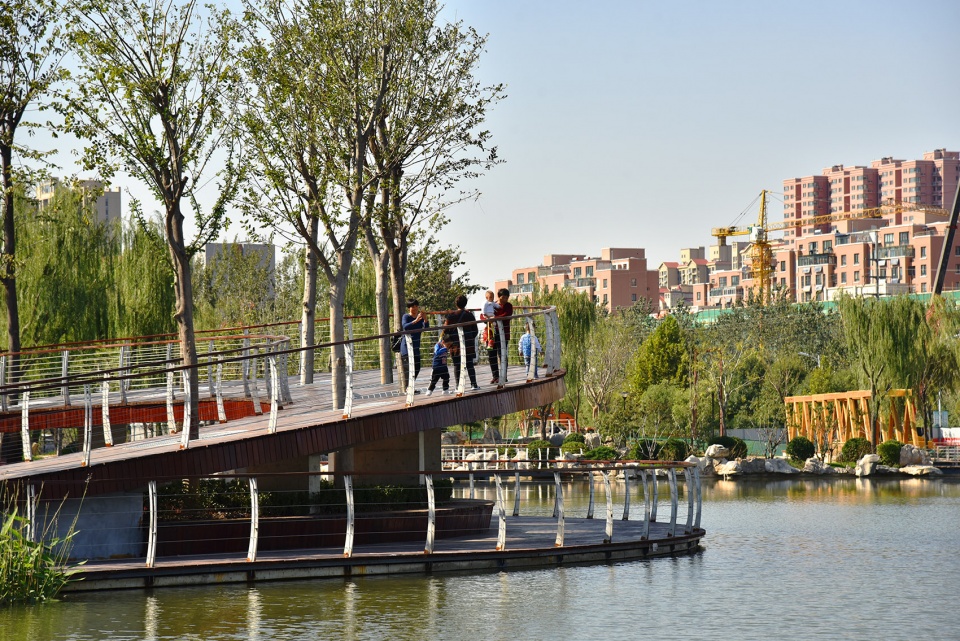 water platform of anlan lake park tree loop china by folie architecture