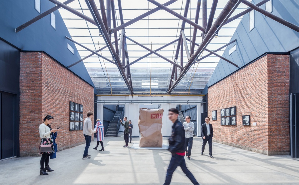 wuhan liangyou red town art design center china by uao