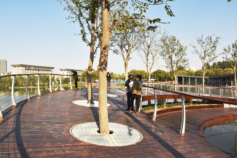water platform of anlan lake park tree loop china by folie architecture
