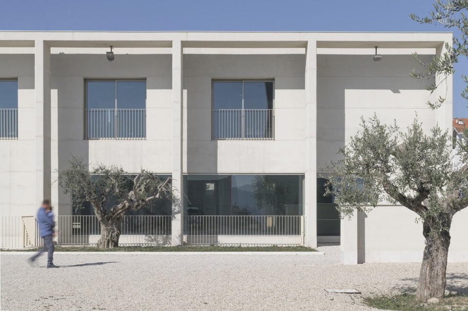 Church and community centre in Castel di Lama Italy by Studio Contini