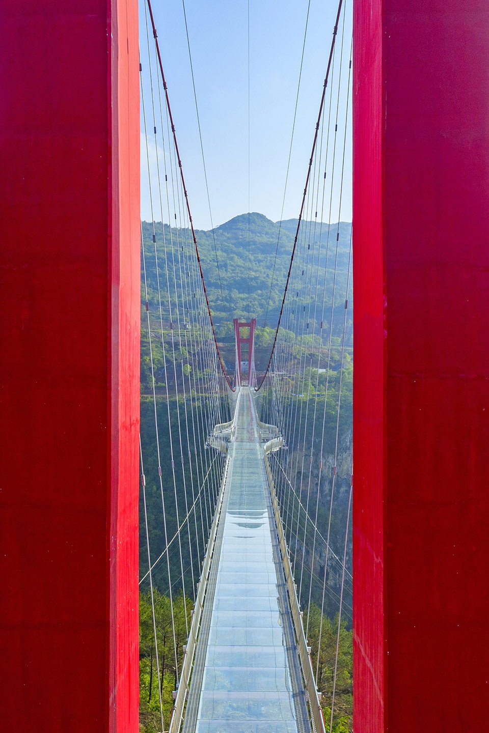 glass bridge in huangchuan three gorges scenic area china by uad