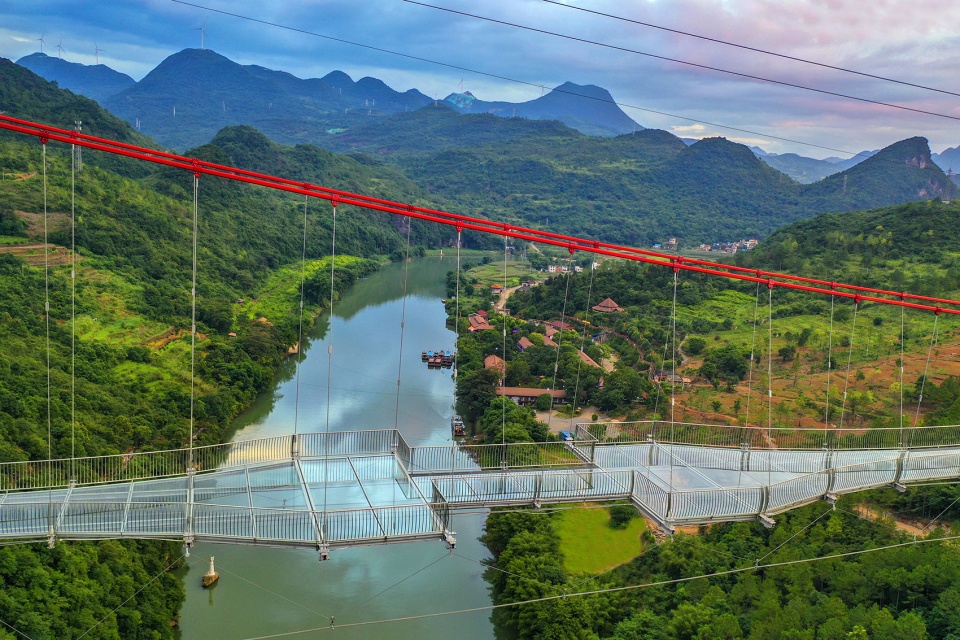 glass bridge in huangchuan three gorges scenic area china by uad