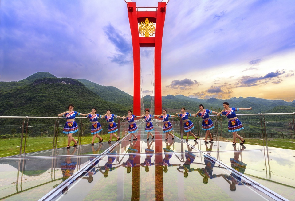 glass bridge in huangchuan three gorges scenic area china by uad