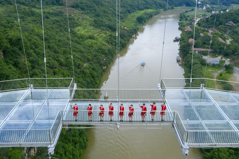 glass bridge in huangchuan three gorges scenic area china by uad