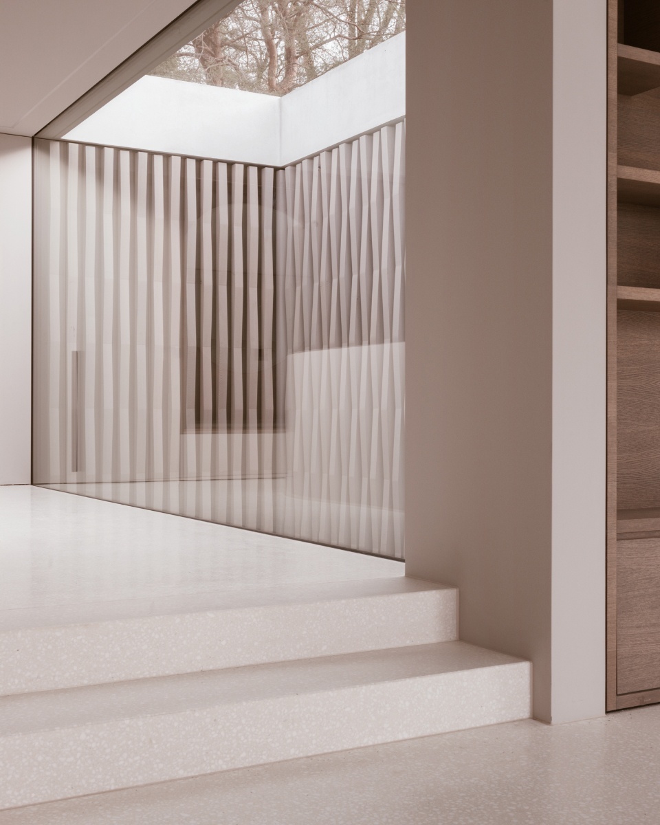 house in a park by think architecture