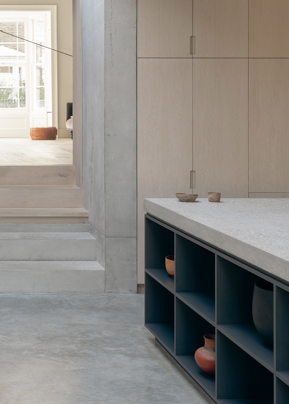 Concrete Plinth House by DGN Studio