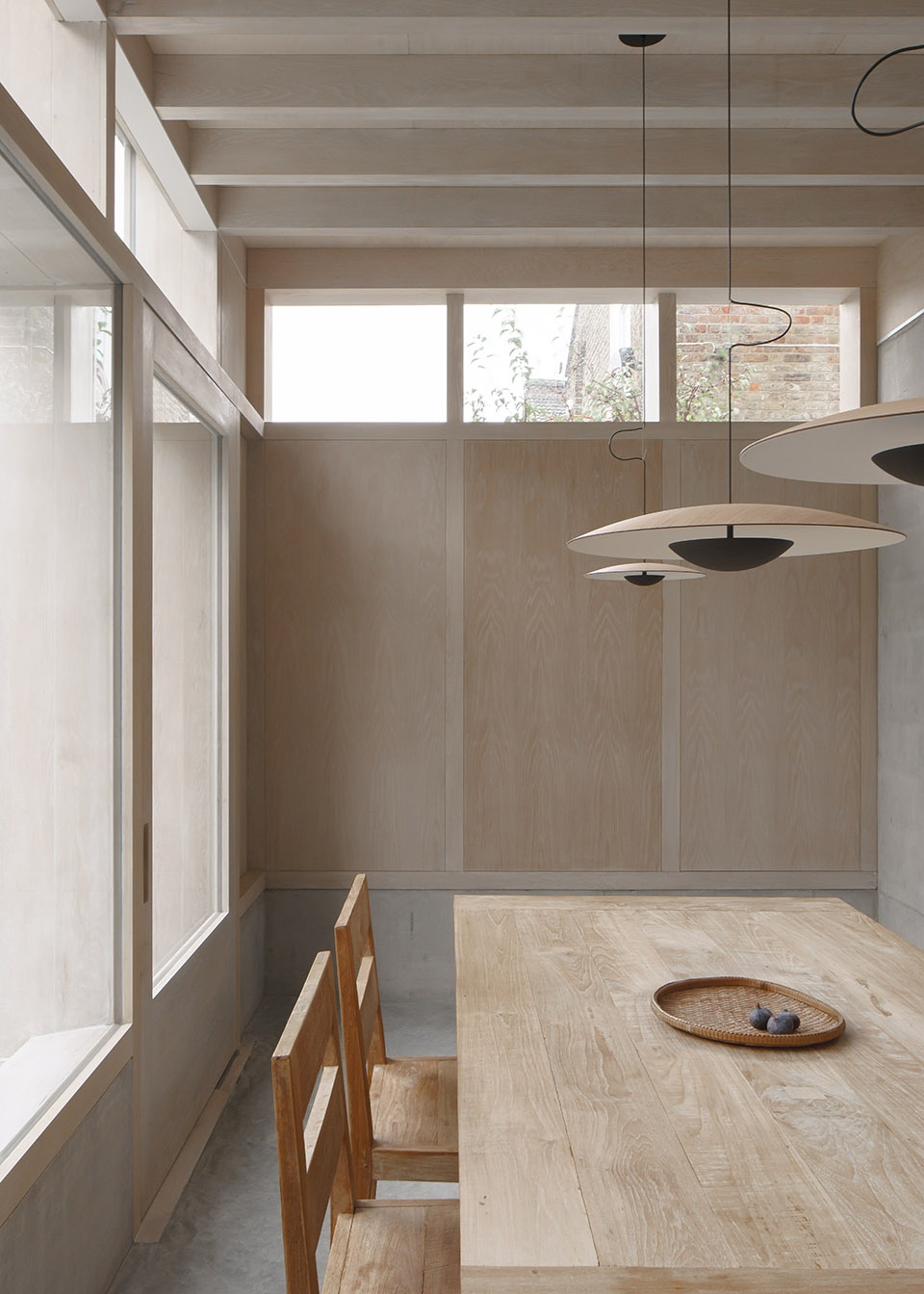 Concrete Plinth House by DGN Studio