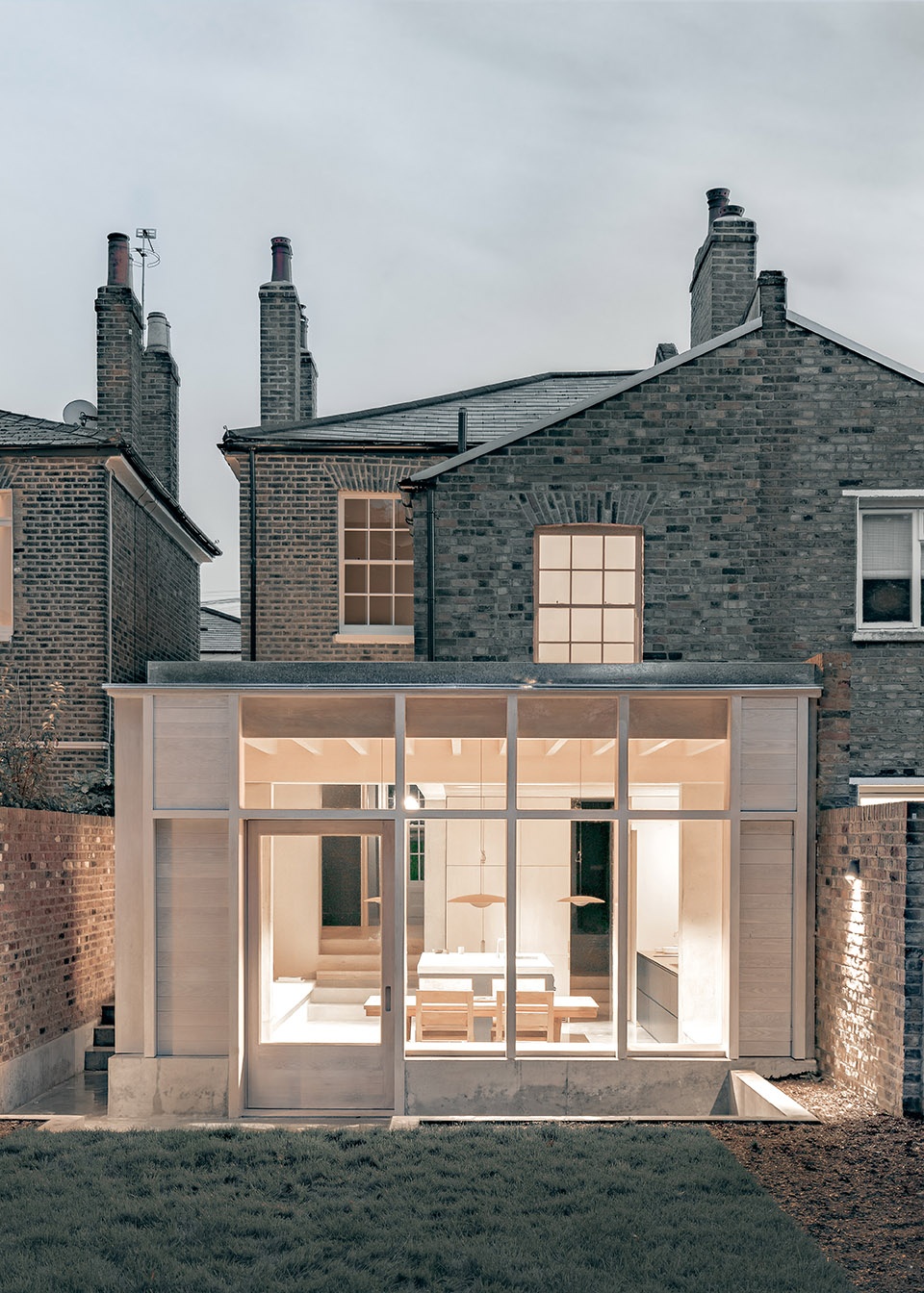 Concrete Plinth House by DGN Studio