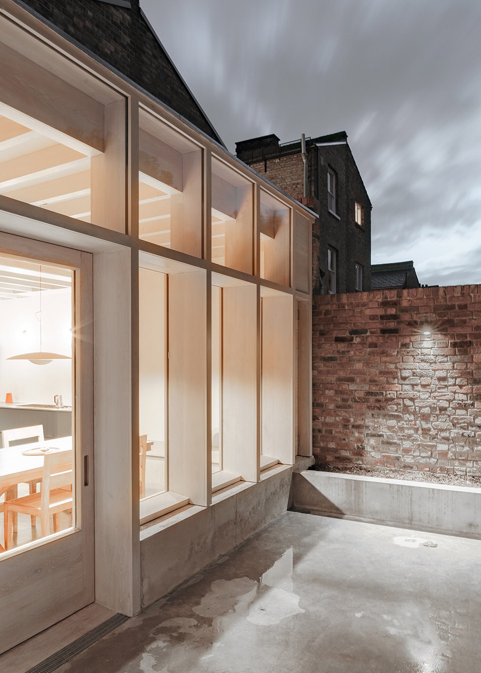 Concrete Plinth House by DGN Studio