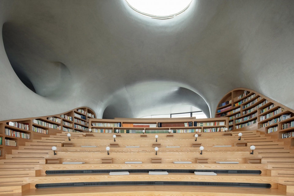 Wormhole Library Interior Design by MAD