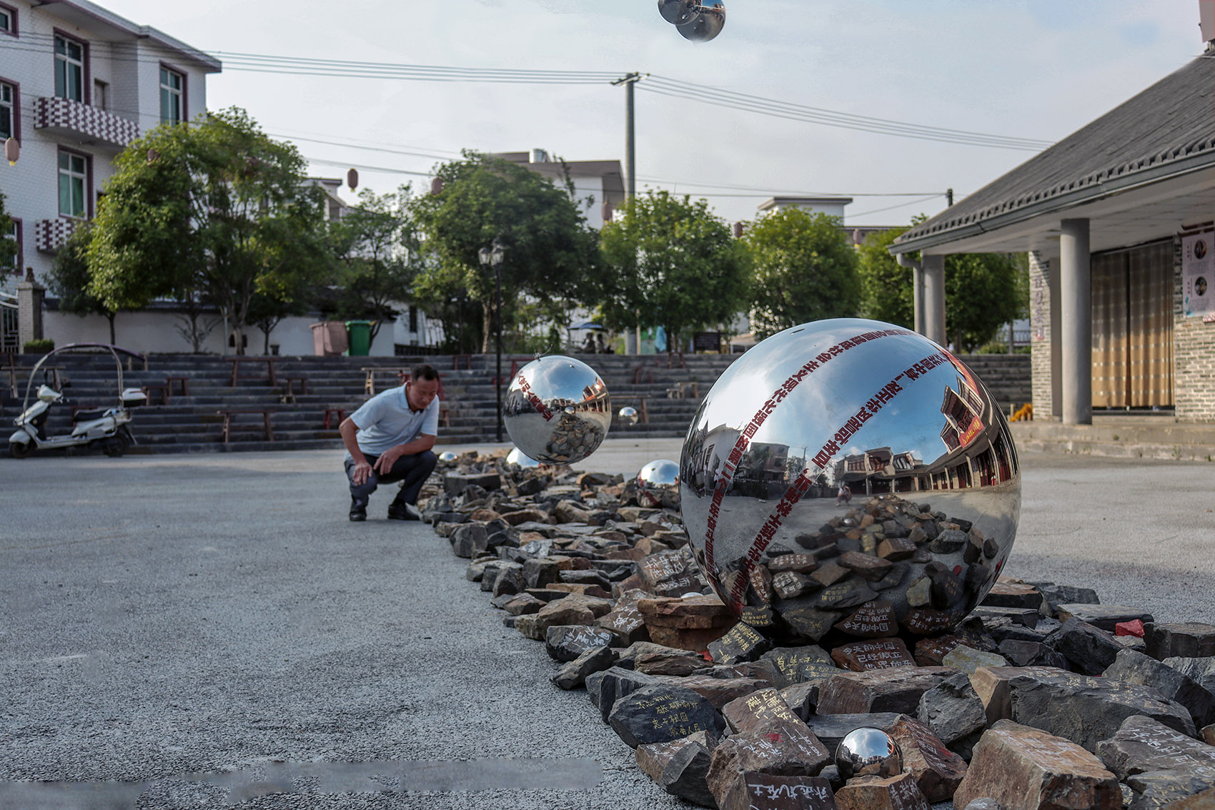 public art project every drop of power can converges into a river china by y shuo studio