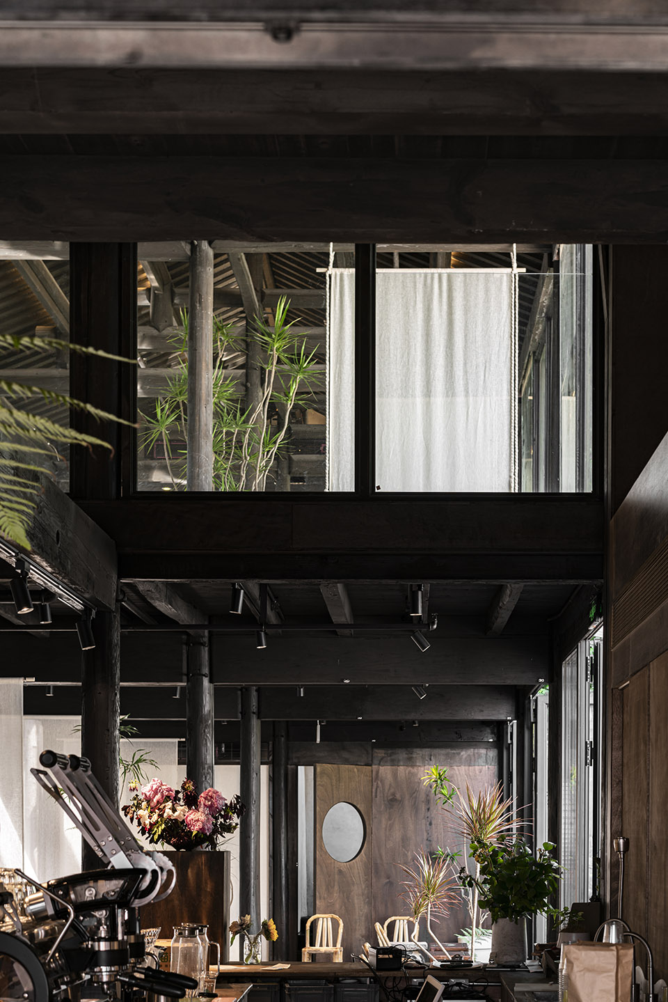 metal hands coffee renovation china by daga architects