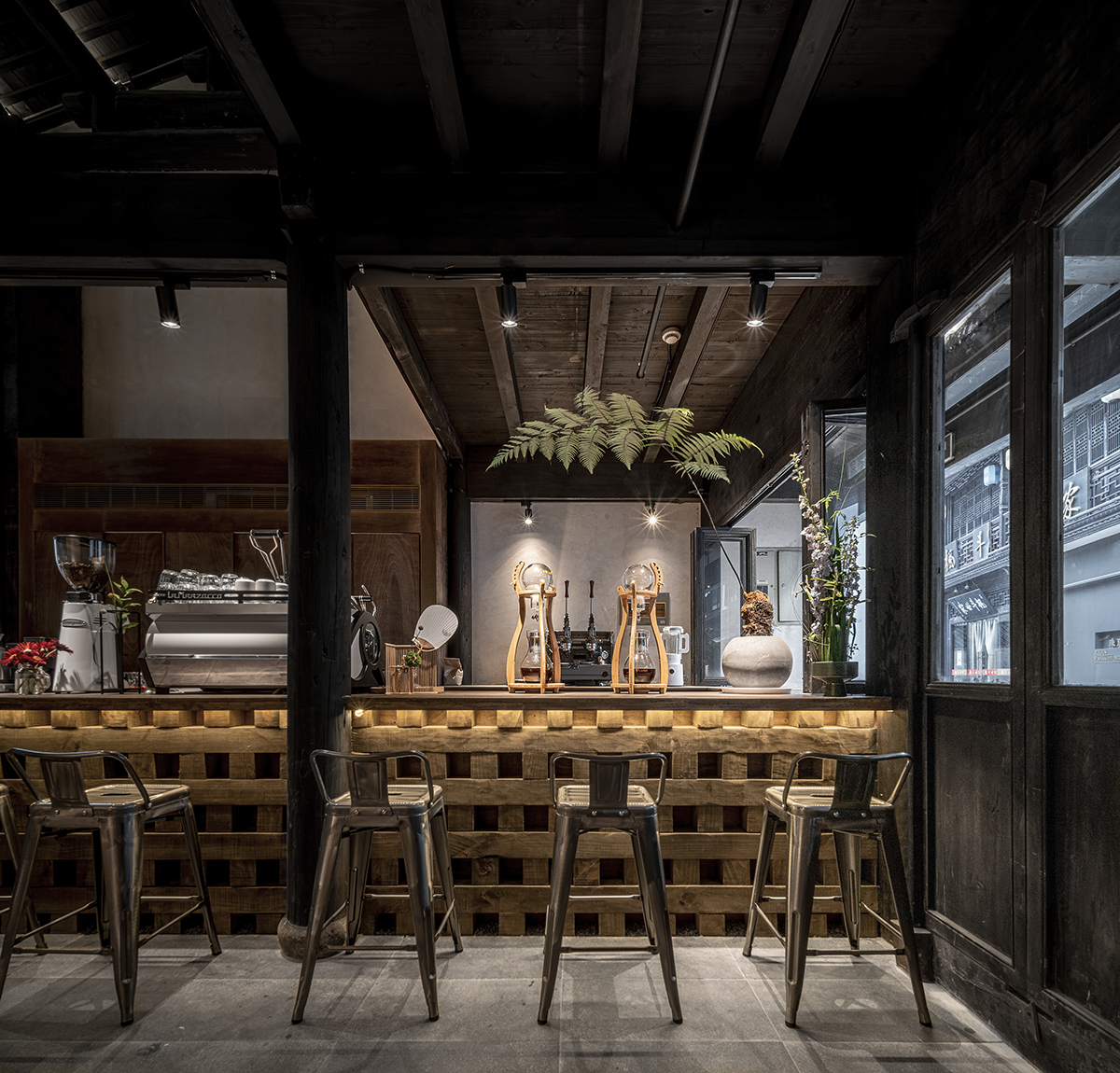metal hands coffee renovation china by daga architects