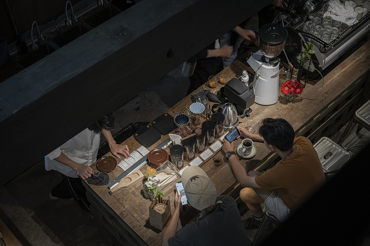 metal hands coffee renovation china by daga architects