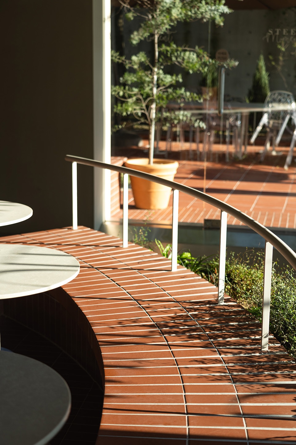steel moment coffee shop and bakery by assemble project