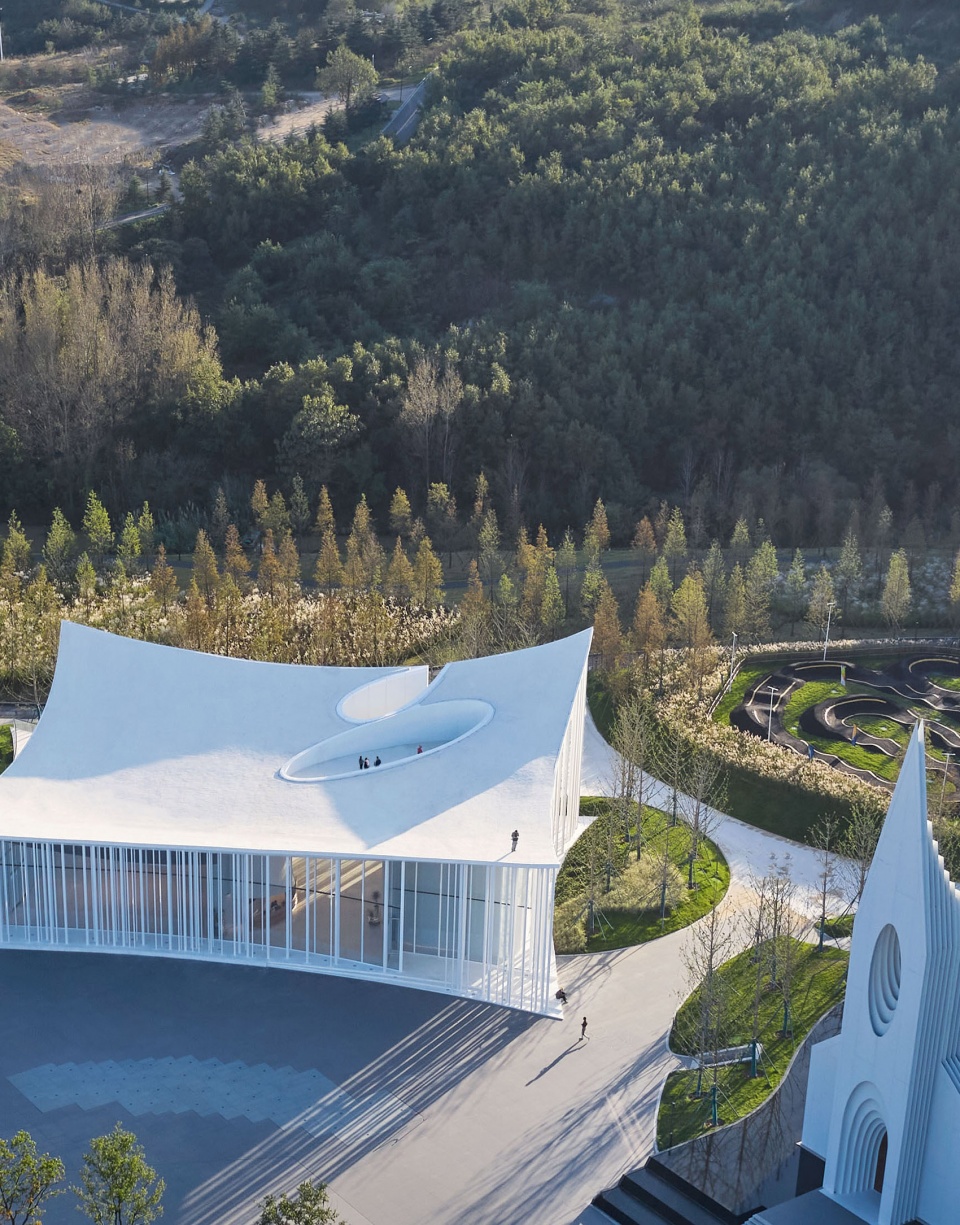 cang ma mountain flying carpet qingdao atour town parent kid centre china by gn architects