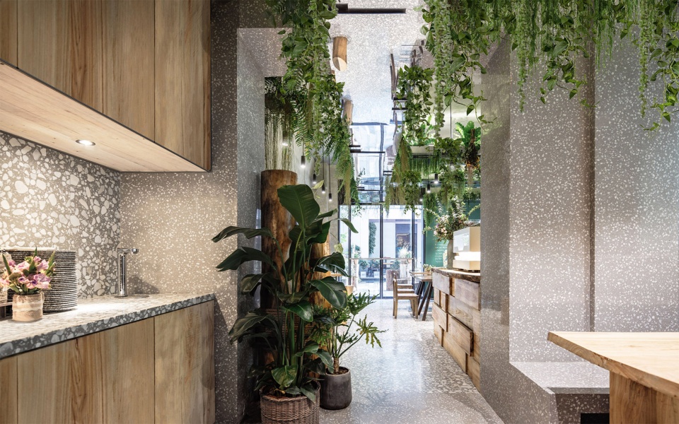 Layered biophilic restaurant in Shanghai by MAP