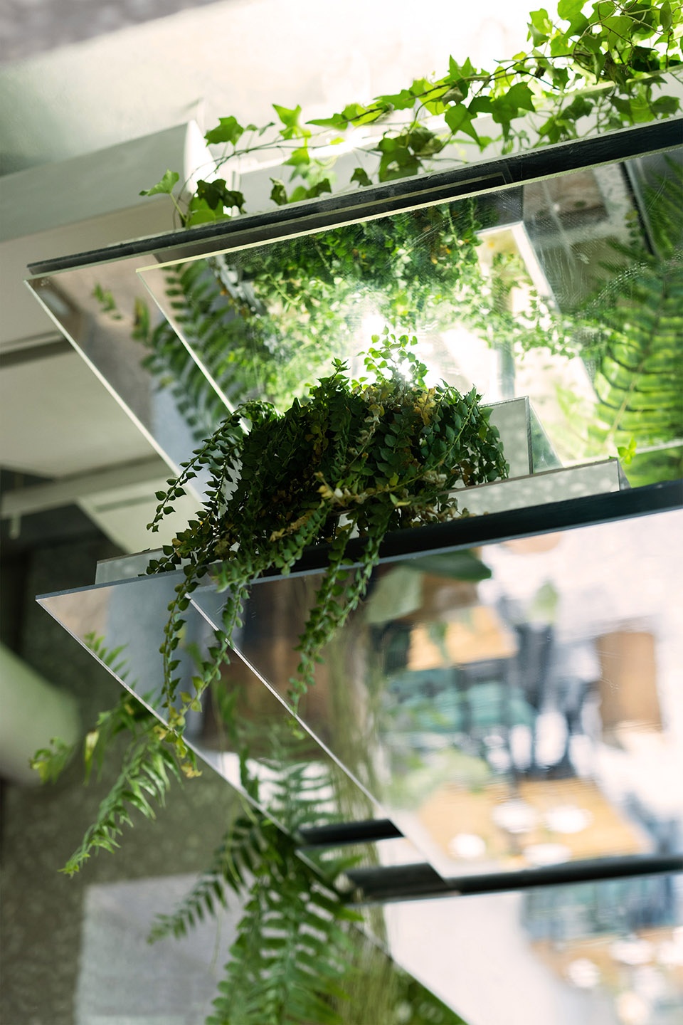 Layered biophilic restaurant in Shanghai by MAP