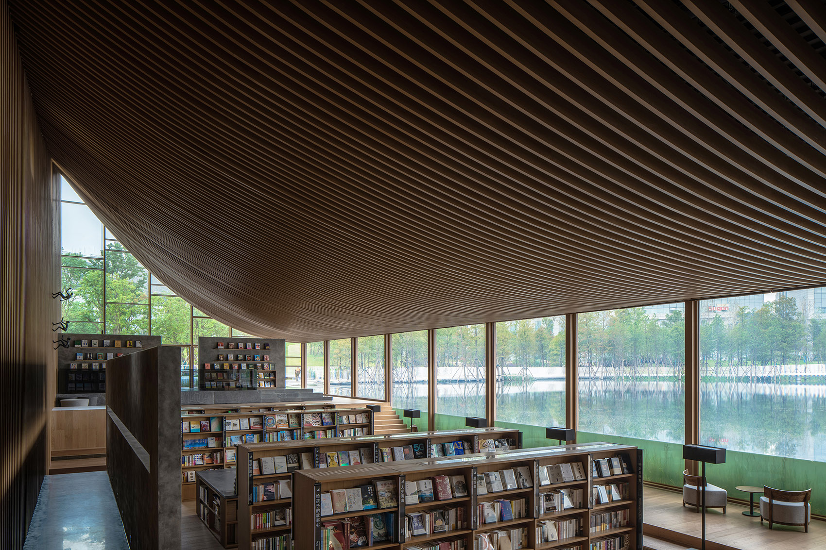 chengdu xinglong lake citic bookstore china by muda architects
