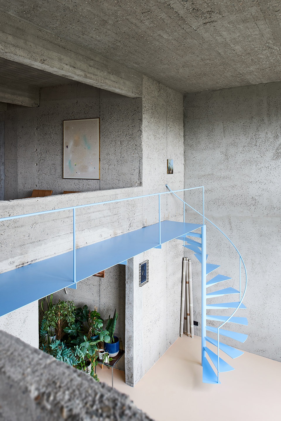 Brutalist duplex apartment in the Riverside Tower by Studio Okami Architects