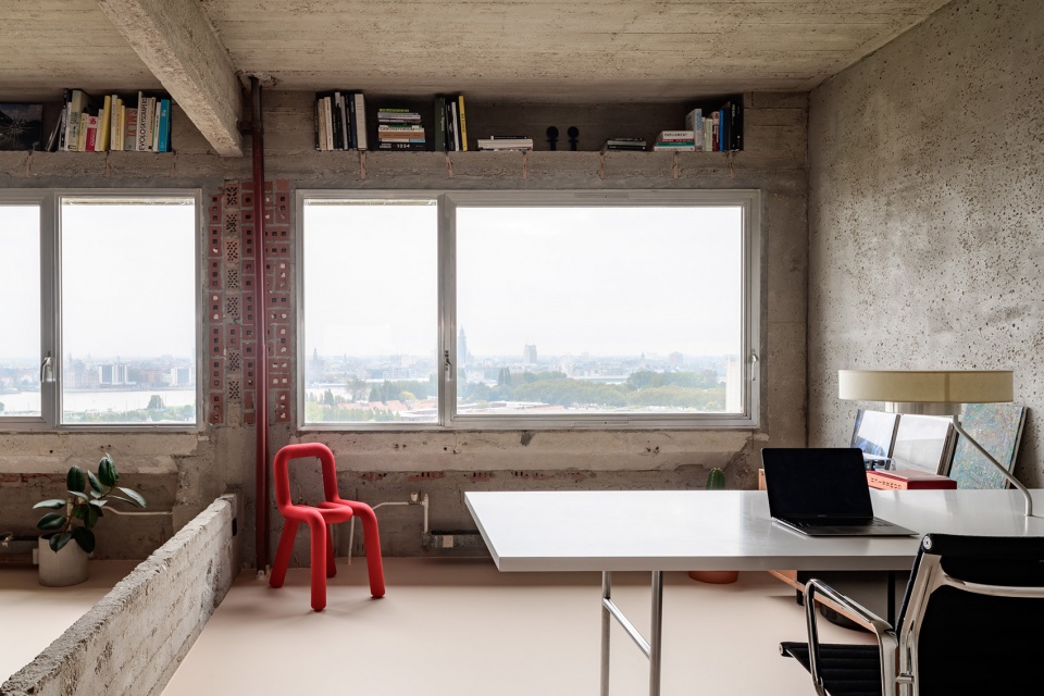 Brutalist duplex apartment in the Riverside Tower by Studio Okami Architects