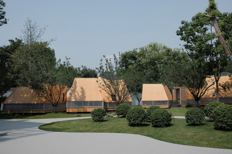 courtyard restaurant in our village by someone studio