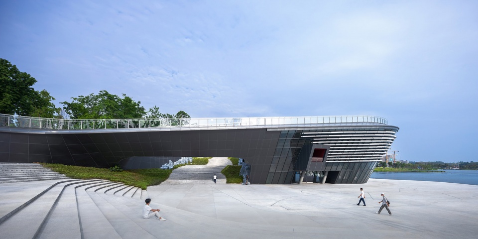 xinglong lake roadshow center by tektonn architects