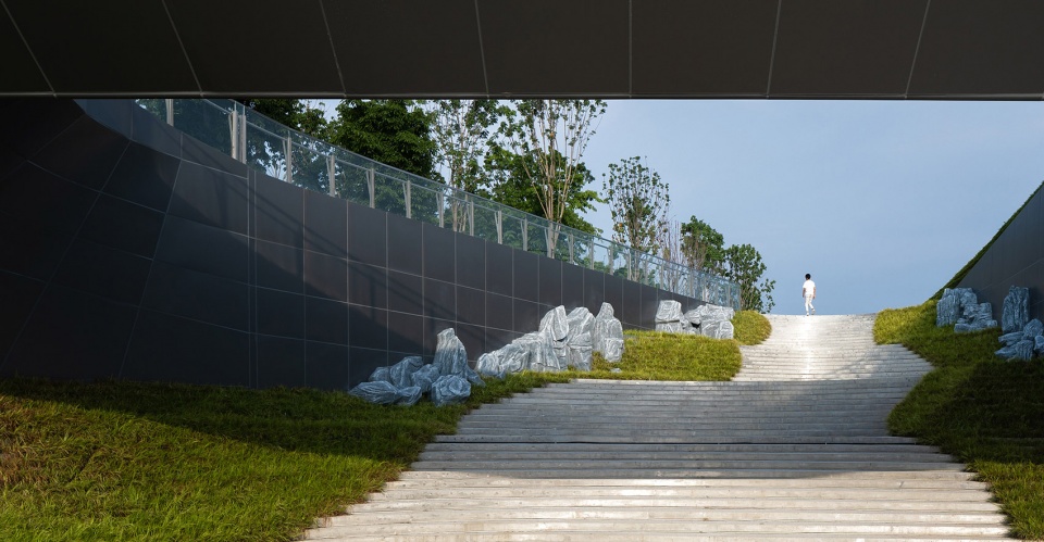 xinglong lake roadshow center by tektonn architects
