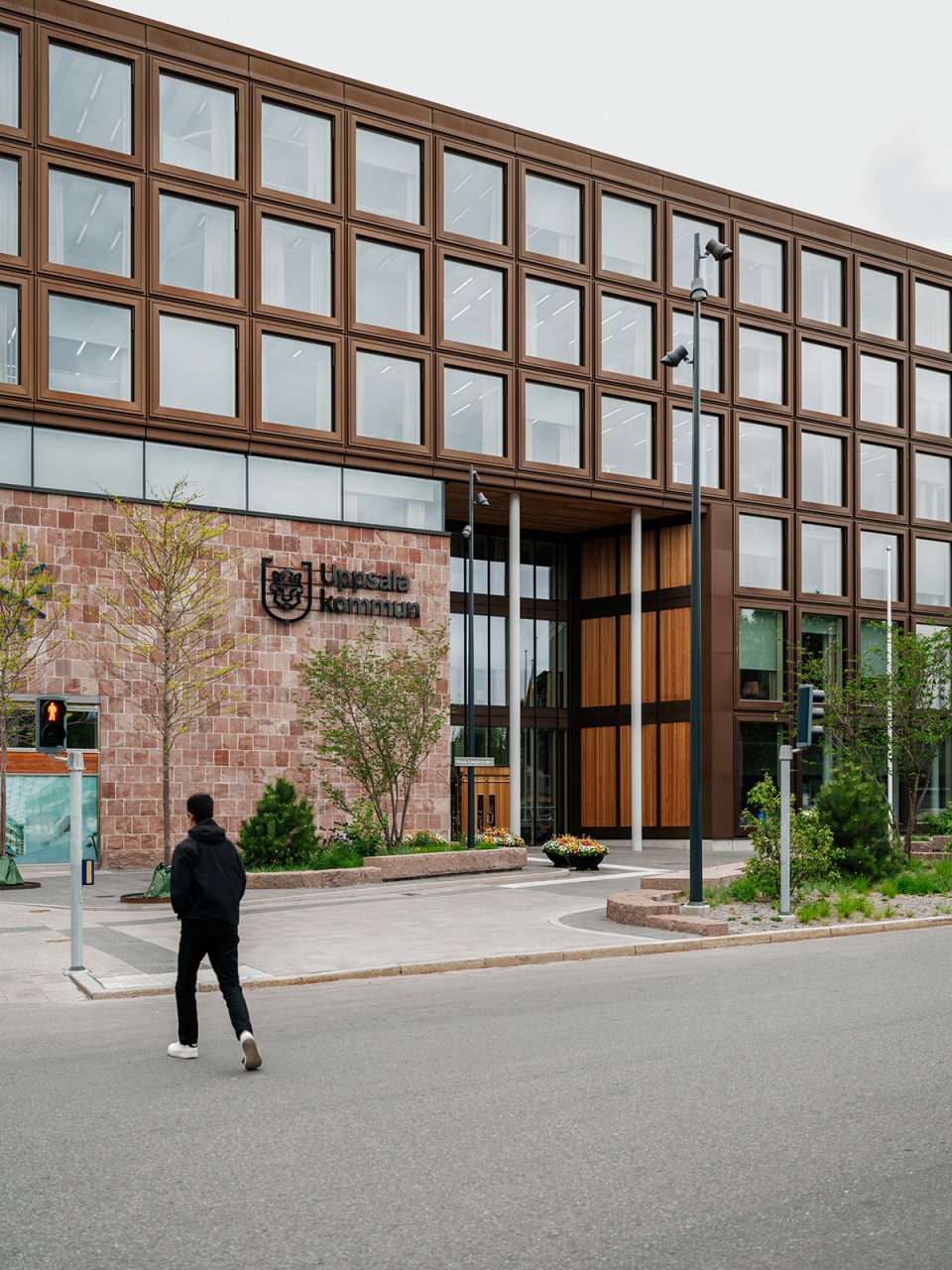 transformation of uppsala town hall by henning larsen