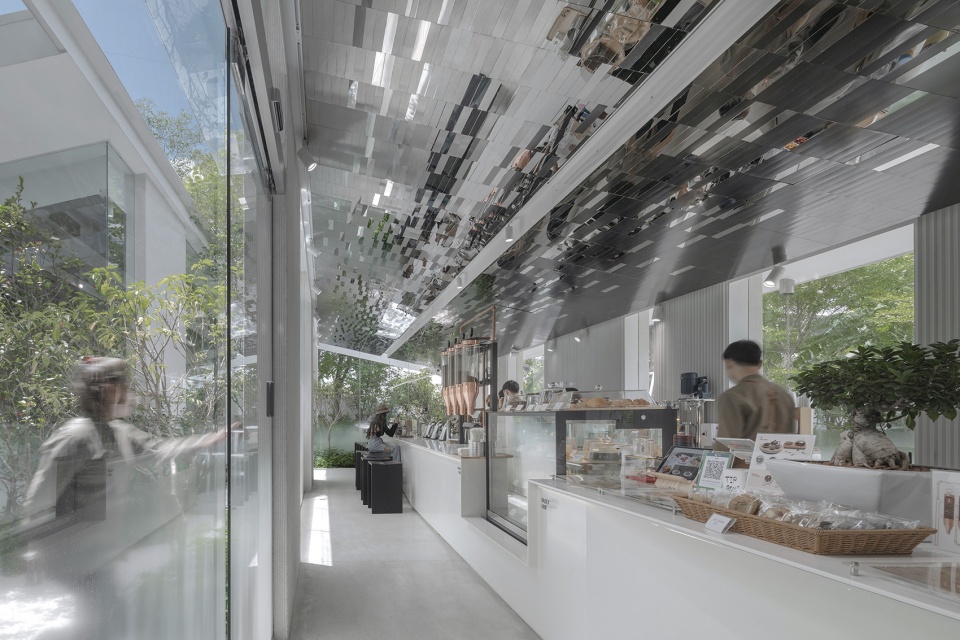 NANA Coffee Roasters Bangna by IDIN Architects