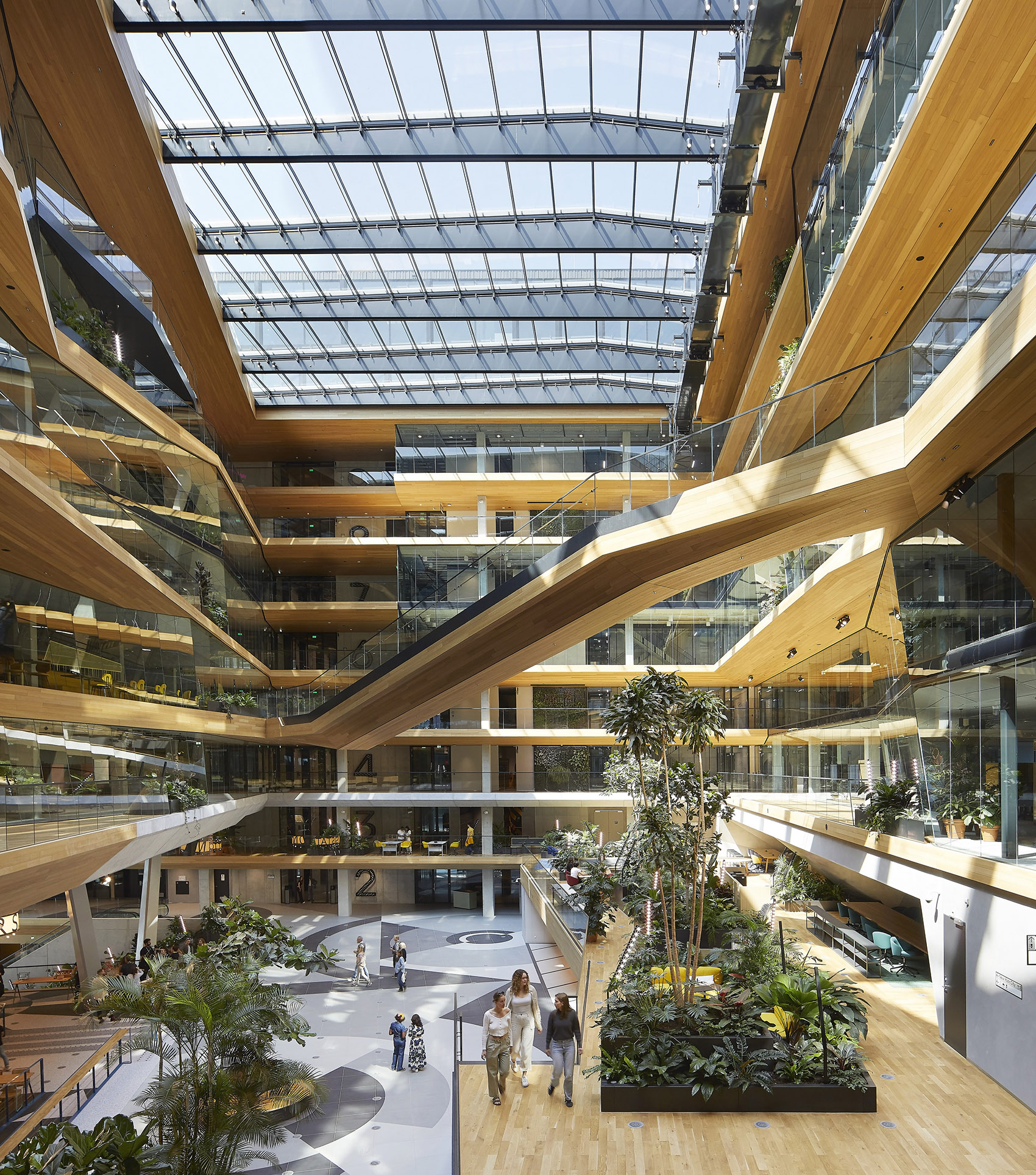 unstudios new city campus for travel leader booking com opens in amsterdam