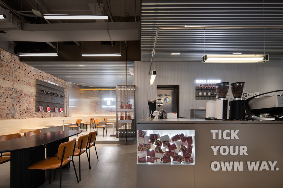 stainless steel and concrete intertwined ticle coffee series by daga architecture