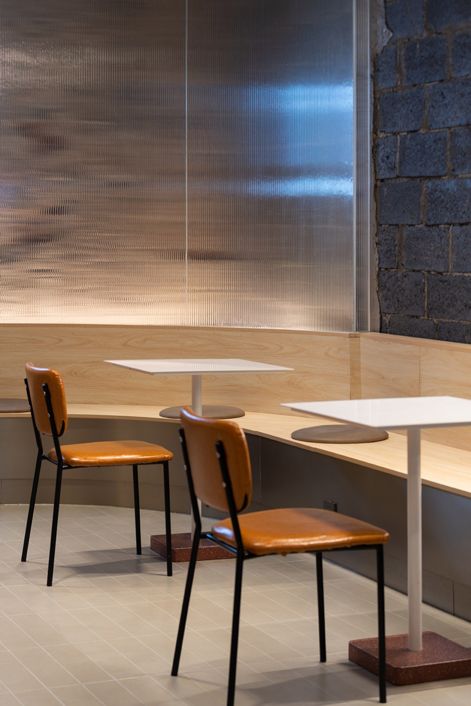 stainless steel and concrete intertwined ticle coffee series by daga architecture