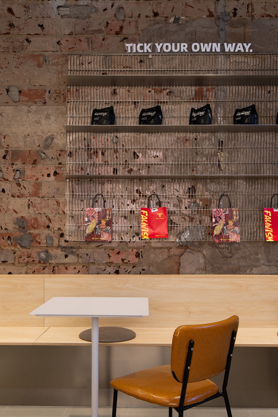 stainless steel and concrete intertwined ticle coffee series by daga architecture